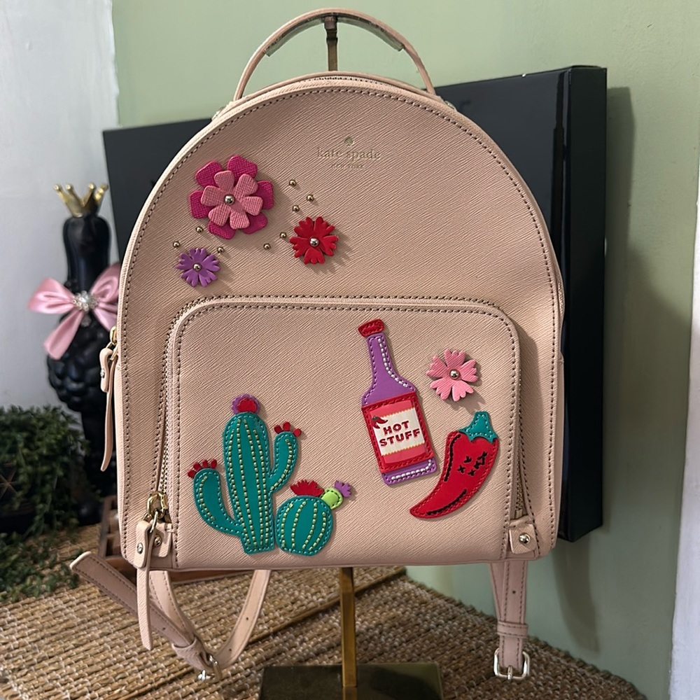Kate Spade Beige Backpack with Vibrant Patches